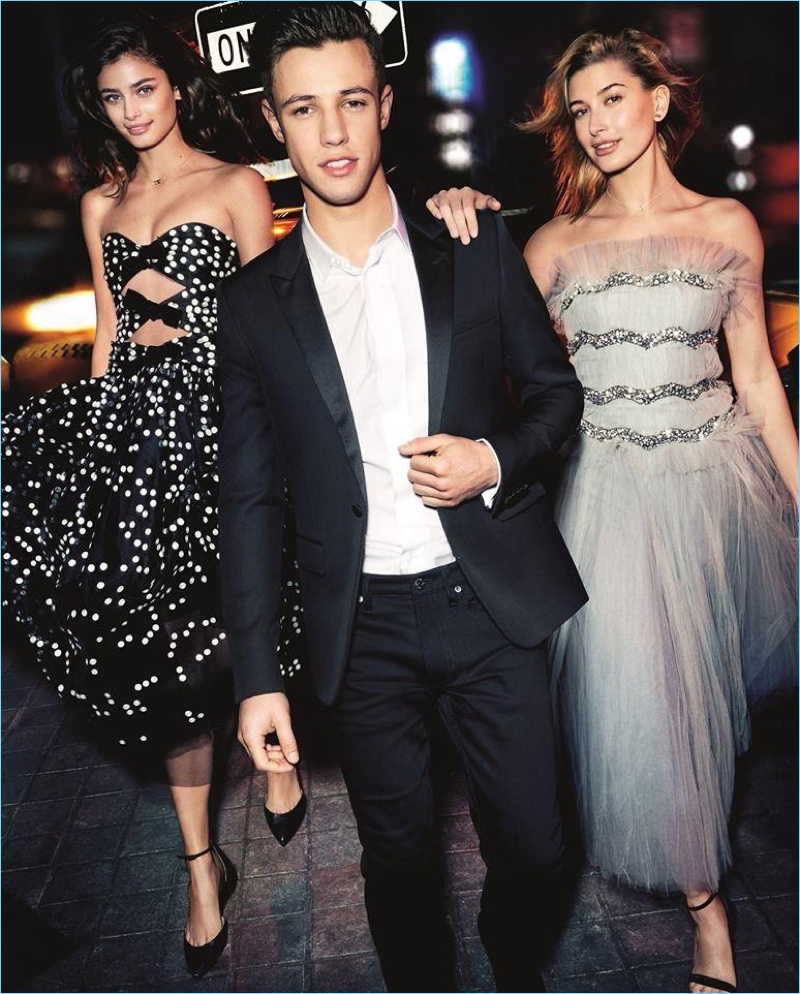 Mario Testino photographs Taylor Hill, Cameron Dallas, and Hailey Baldwin for Carolina Herrera's 212 VIP Black campaign.