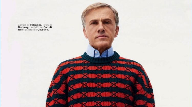 Actor Christoph Waltz wears a Valentino sweater, Burberry shirt, and Cerruti 1881 pants.