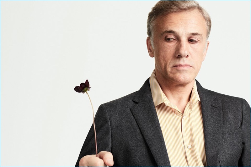 Christoph Waltz wears a Prada wool blazer with a Joseph striped shirt.