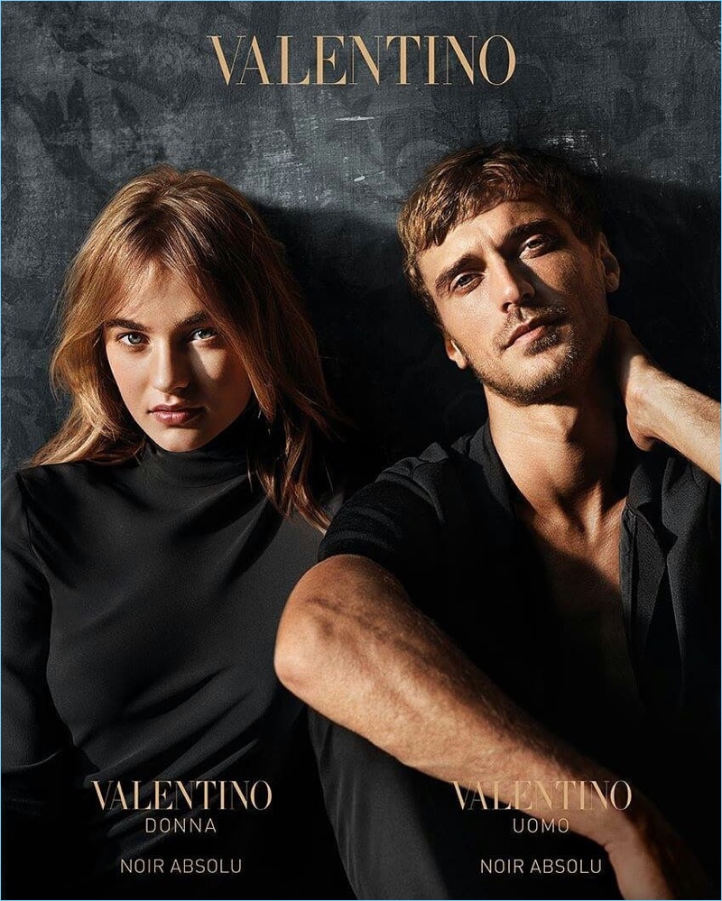 Models Clément Chabernaud and Maarje Verhoef appear in Valentino's Noir Absolu fragrance campaign.