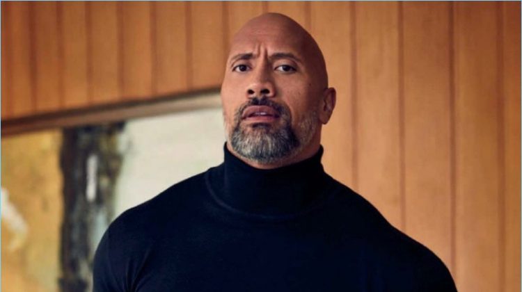 A chic vision, Dwayne 'The Rock' Johnson wears a Brioni turtleneck with Ralph Lauren trousers, and a Montblanc watch.