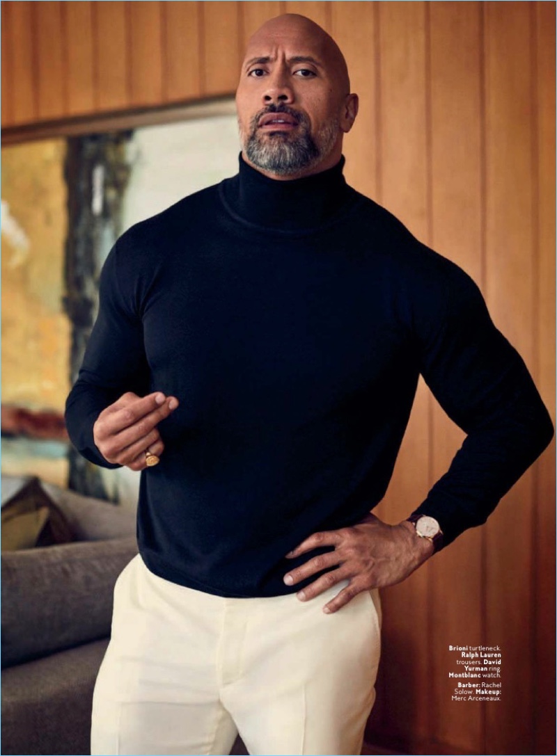 A chic vision, Dwayne 'The Rock' Johnson wears a Brioni turtleneck with Ralph Lauren trousers, and a Montblanc watch. » Dwayne 'The Rock' Johnson is Seriously Chic for InStyle Shoot A chic vision, Dwayne 'The Rock' Johnson wears a Brioni turtleneck with Ralph Lauren trousers, and a Montblanc watch.