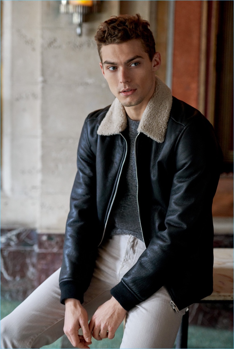 The Friend Meet-up: Jacob Hankin wears a Theory shearling bomber jacket and cashmere sweater. He also sports 7 For All Mankind jeans and an Uniform Wares C35 watch.