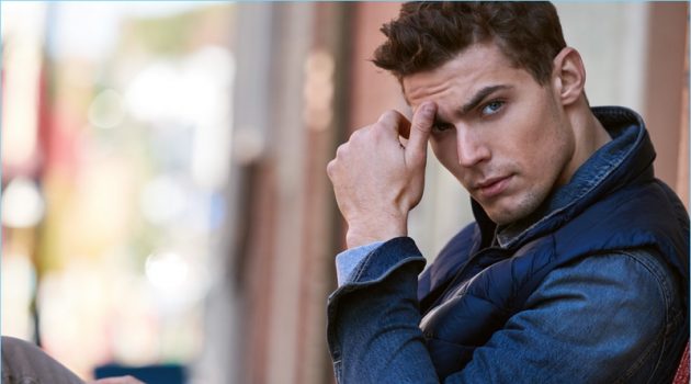 East Dane Unveils Holiday Dress Code: Off-Duty Edition Model Jacob Hankin wears a Sunspel sweatshirt, AG jacket, and an Arc'Teryx Cerium vest. The Australian model also sports 7 For All Mankind jeans.