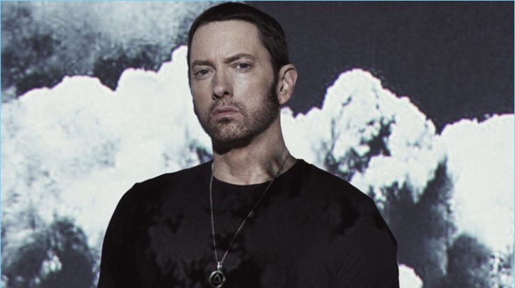 Rapper Eminem wears a Goodlife t-shirt with AllSaints pants.