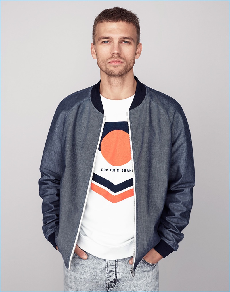 Benjamin Eidem rocks a bomber jacket and graphic tee by Esprit.