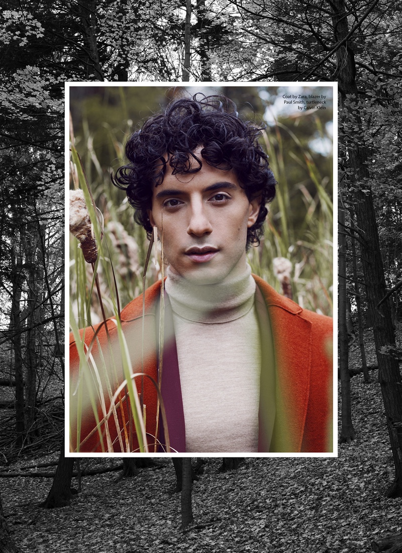 Reza wears coat Zara, blazer Paul Smith, and turtleneck Calvin Klein.