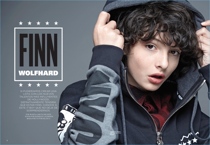 Stranger Things actor Finn Wolfhard wears a Philipp Plein hoodie with a Pierre Balmain shirt.