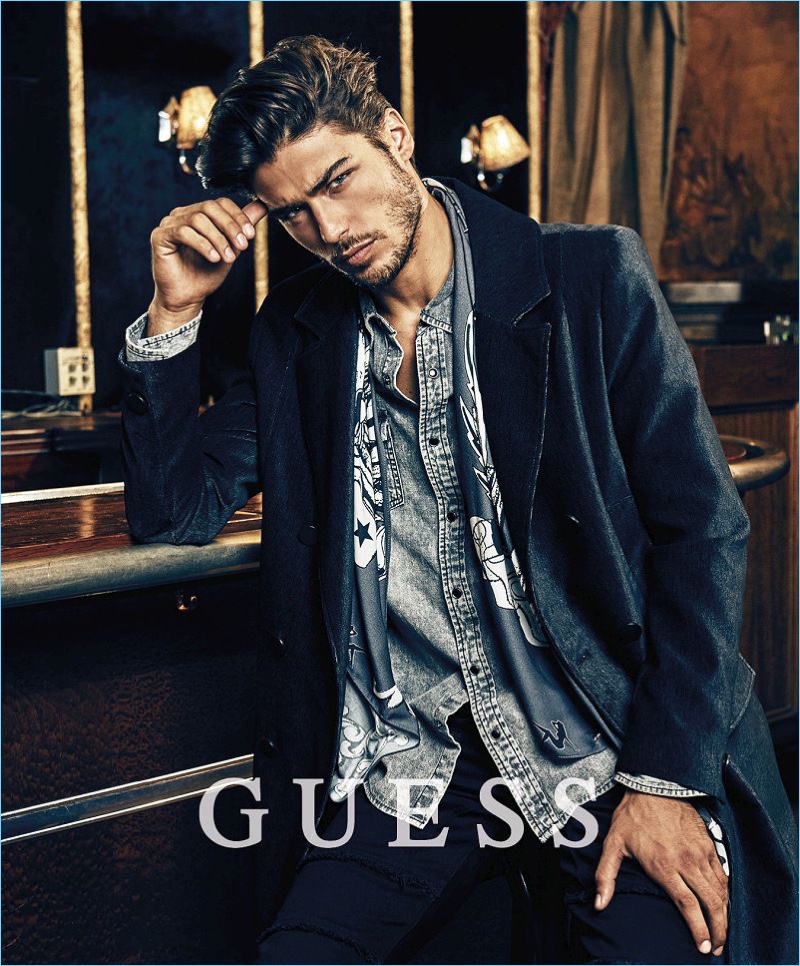 Model Alessandro Dellisola appears in Guess' holiday 2017 campaign.