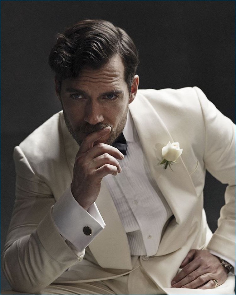 English actor Henry Cavill dons a white tuxedo jacket for The Rake.