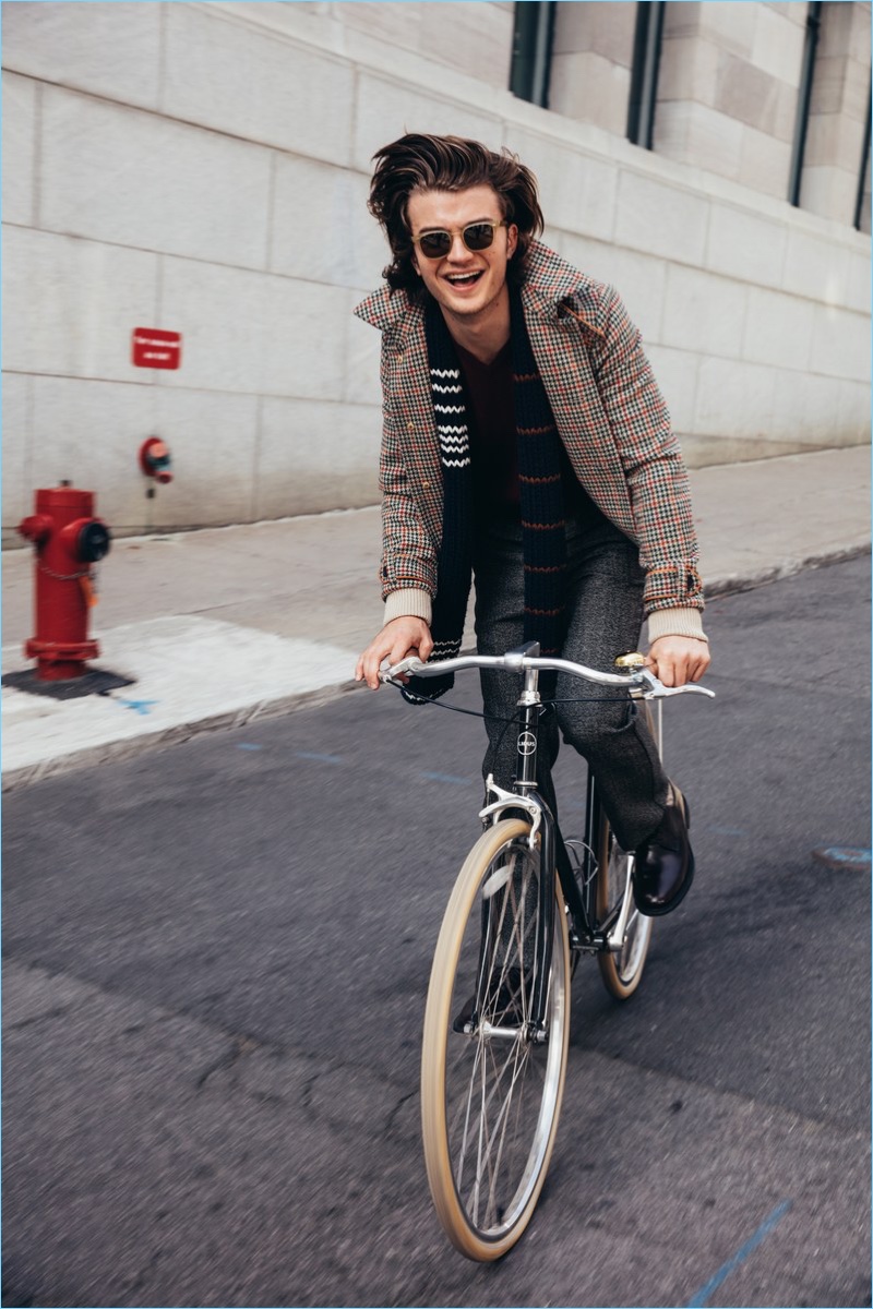 Taking a bike ride, Joe Keery wears a Prada jacket, sweater, scarf, and trousers. He accessorizes with Church's shoes and Steven Alan sunglasses. » Joe Keery Goes Diner Hopping with GQ, Talks Great Hair Taking a bike ride, Joe Keery wears a Prada jacket, sweater, scarf, and trousers. He accessorizes with Church's shoes and Steven Alan sunglasses.