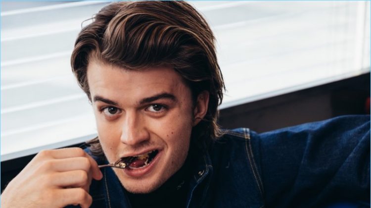 Enjoying breakfast at Beautys Luncheonette, Joe Keery wears a Calvin Klein turtleneck and denim jacket.