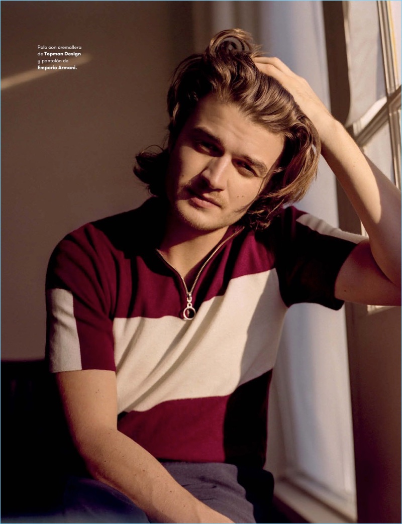 Actor Joe Keery wears a Topman Design polo with Emporio Armani pants.