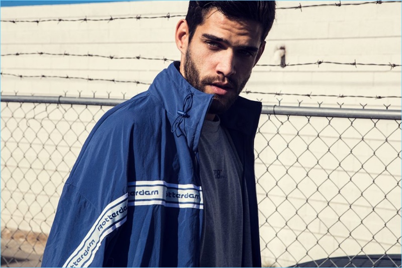 Landon Falgoust wears a blue Vetements x Reebok tracksuit jacket.