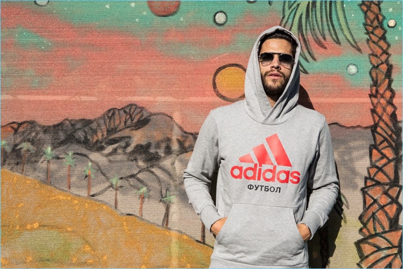 Going casual, Landon Falgoust sports a Gosha Rubchinskiy x Adidas hoodie.