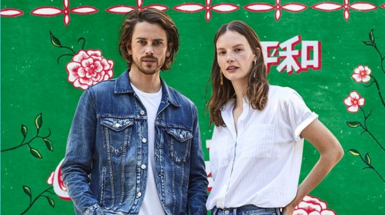 Models Jeremy Young and Sara Blomqvist front Levi's holiday 2017 outing.