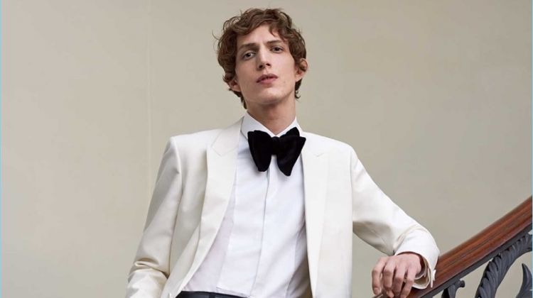 Dressed for a formal event, Xavier Buestel wears a Saint Laurent tuxedo jacket with a Valentino shirt. He also dons Lemaire trousers and a Prada leather belt.