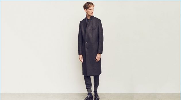 Bastiaan Ninaber Dons Winter Essentials for Matches Fashion Front and center, Bastiaan Ninaber wears a double-breasted coat and track pants by Wooyoungmi. The top model also sports a Lemaire shirt and Lanvin derby shoes.