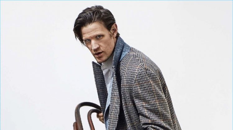 Actor Matt Smith dons a coat, jacket, shirt, and trousers by Canali with O'Keeffe boots.