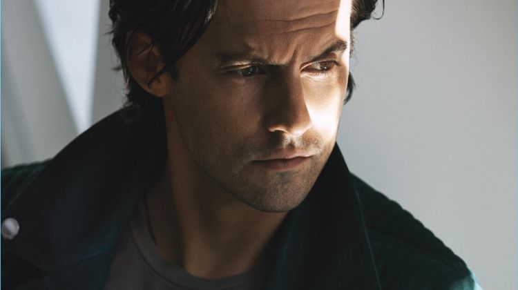 Starring in a photo shoot, Milo Ventimiglia sports a suede Burberry jacket with a Kenneth Cole t-shirt.
