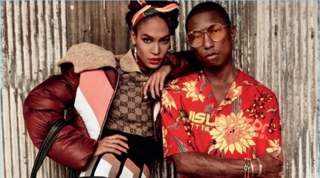 Pharrell Covers Special Edition of Vogue, Rocks Eclectic Style Embracing tropical style, Pharrell appears in a photo shoot with Joan Smalls. He wears a Louis Vuitton shirt with Cactus Plant Flea Market shorts, and Gentle Monster sunglasses. The artist also sports Adidas Originals sneakers and a Balenciaga bag.
