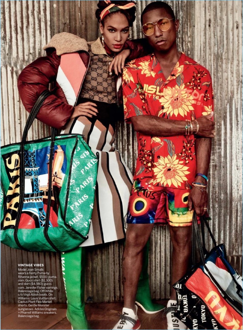 Embracing tropical style, Pharrell appears in a photo shoot with Joan Smalls. He wears a Louis Vuitton shirt with Cactus Plant Flea Market shorts, and Gentle Monster sunglasses. The artist also sports Adidas Originals sneakers and a Balenciaga bag.