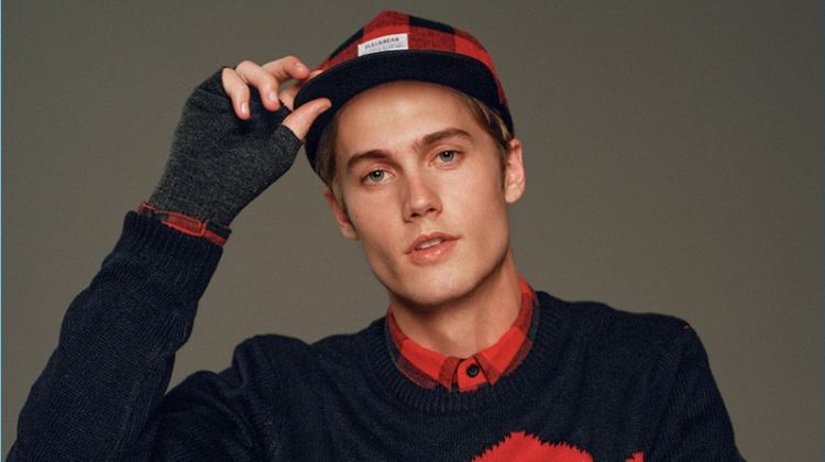 Model Neels Visser sports a holiday sweater from Pull & Bear.
