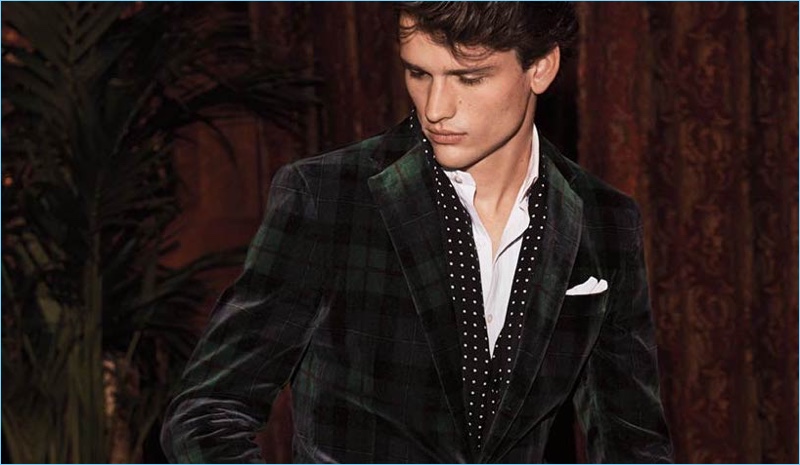 Donning a plaid velvet blazer, Simon Nessman fronts Ralph Lauren's holiday 2017 campaign.