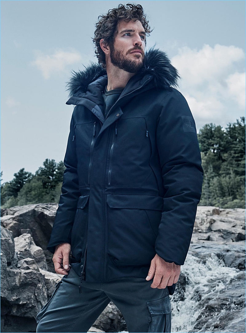 Justice Joslin sports a parka by The North Face. He also wears LE 31 cargo joggers.