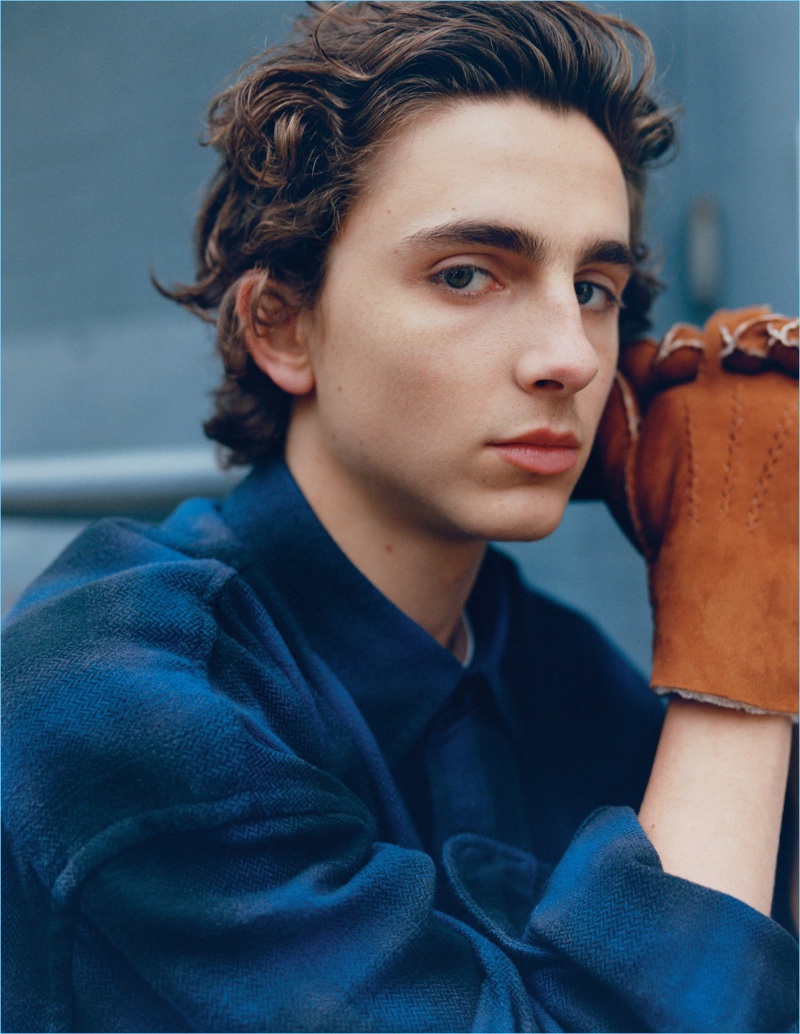 Call Me By Your Name star Timothée Chalamet dons a Vince shirt with Hestra gloves.