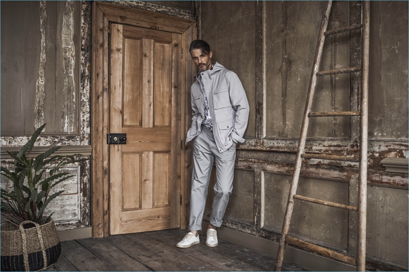 Making a case for monochromatic outfits, Ben Hill wears a pale grey look.