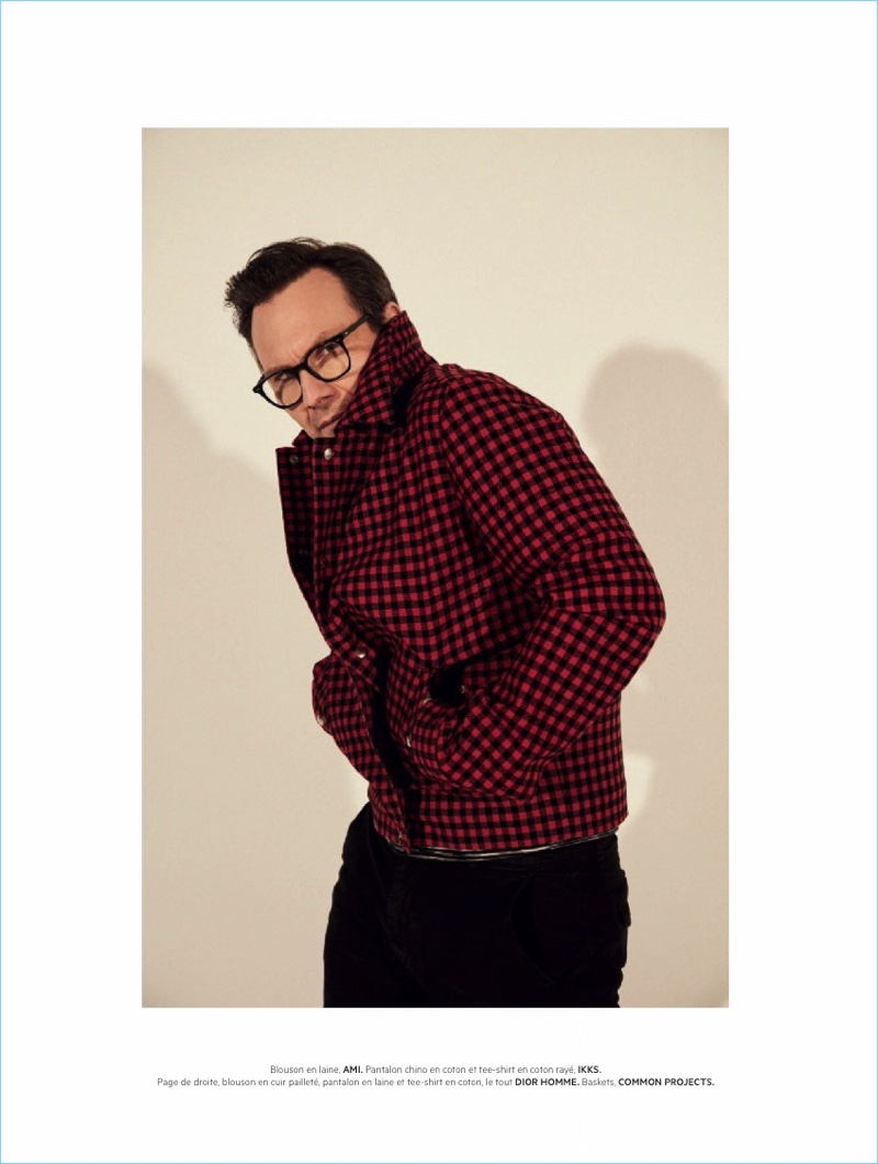 Making a statement in red, Christian Slater wears an AMI jacket with an IKKS striped tee and chinos.