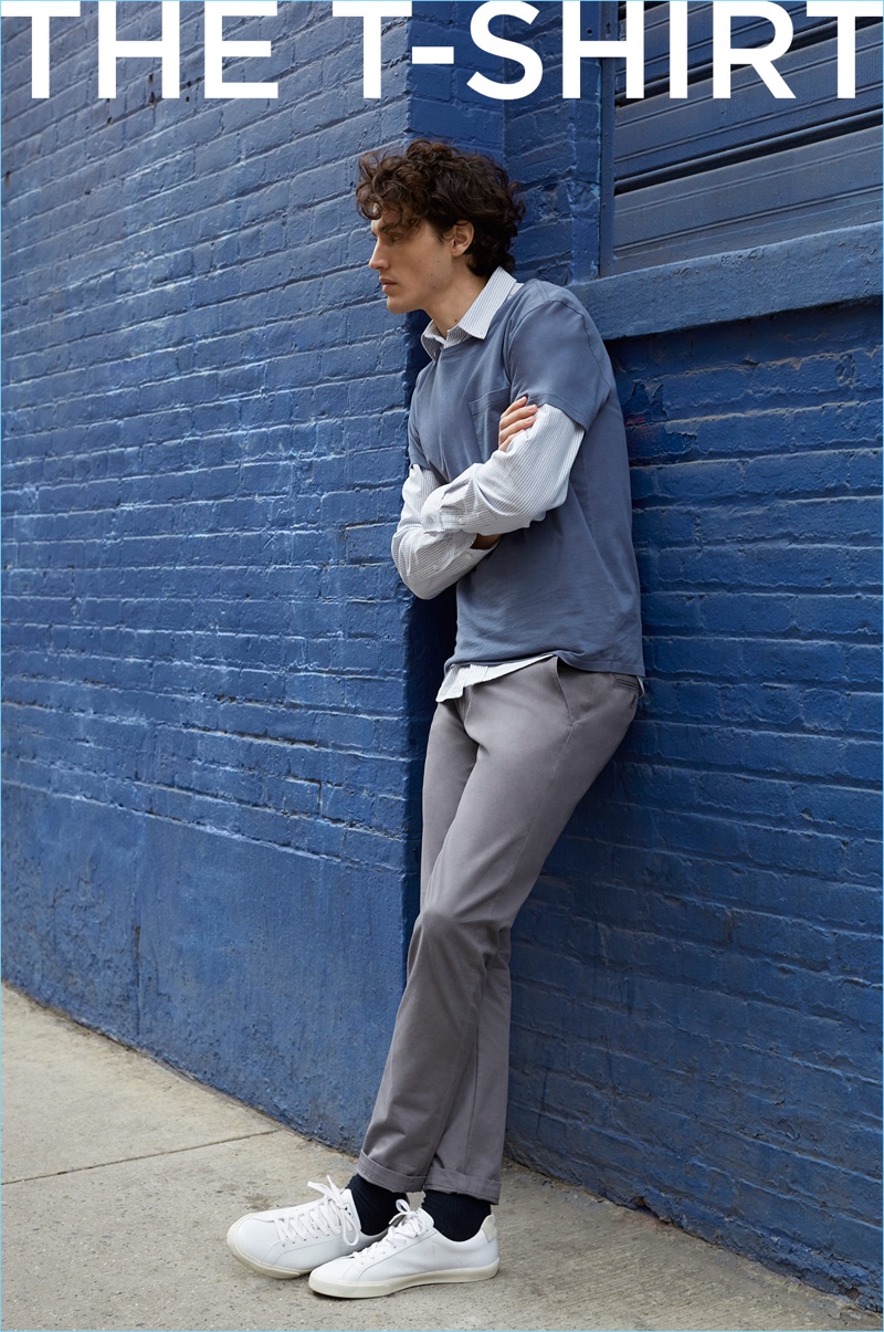 Club Monaco takes its stripe oxford shirt and pairs it with a pocket tee, stretch chinos, and Veja sneakers.