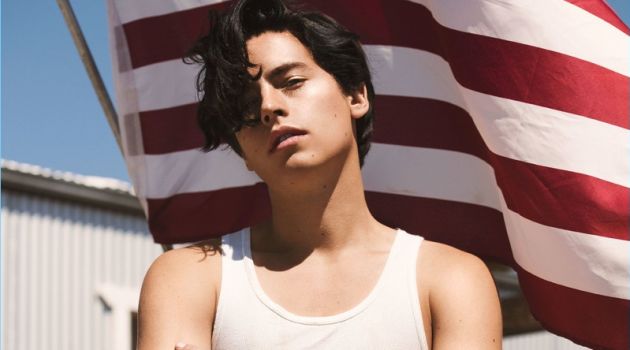 Cole Sprouse wears a Greg Lauren tank with Ports 1961 jeans.