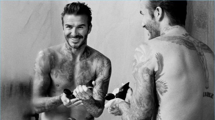 A shirtless David Beckham promotes his new grooming line, House 99.