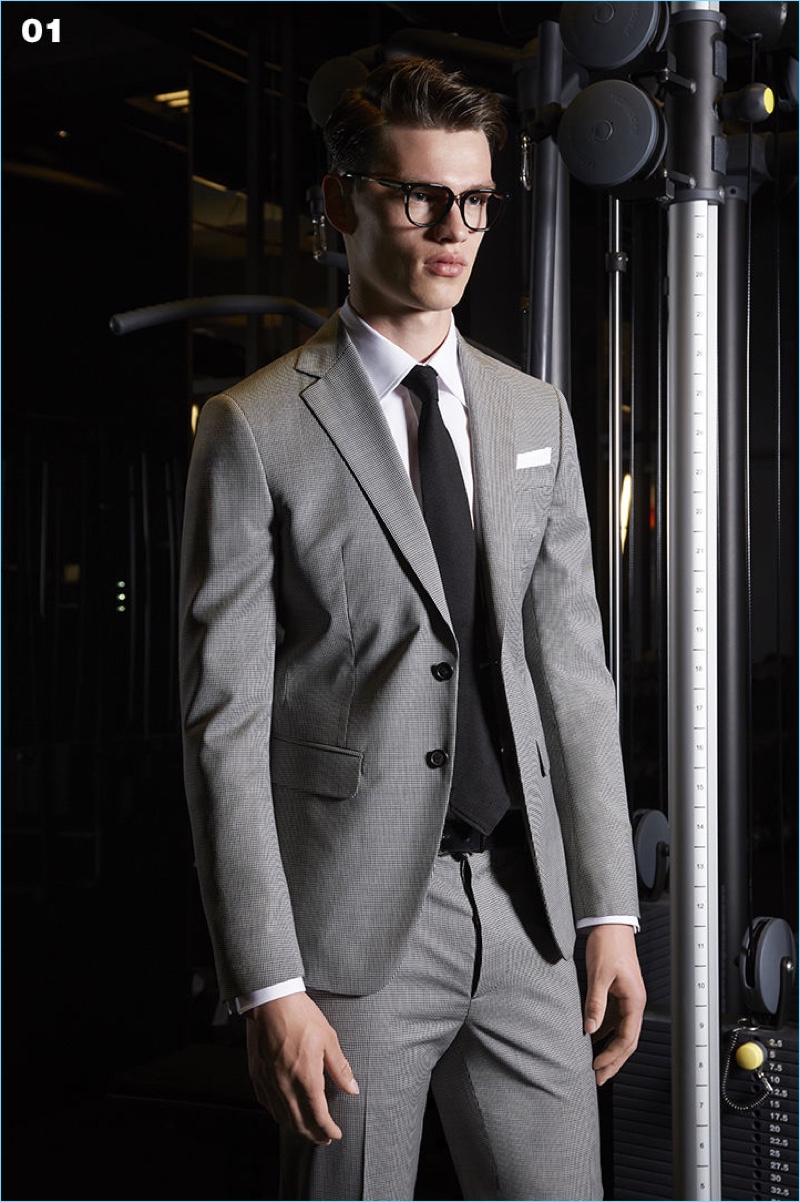 Filip Hrivnak dons a single-breasted suit in grey by Dsquared2.