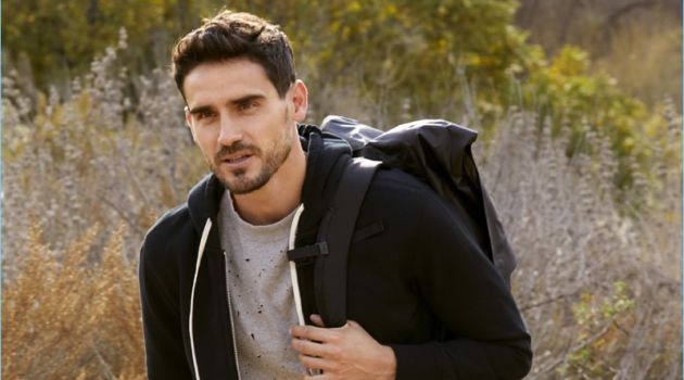 The Activewear Edit: Arthur Kulkov Sports New Styles from East Dane Connecting with East Dane, Arthur Kulkov wears a Satisfy muscle tee and Reigning Champ hoodie. He also dons Champion sweatshorts, an Arc'Teryx daypack, and APL: Athletic Propulsion Labs sneakers.