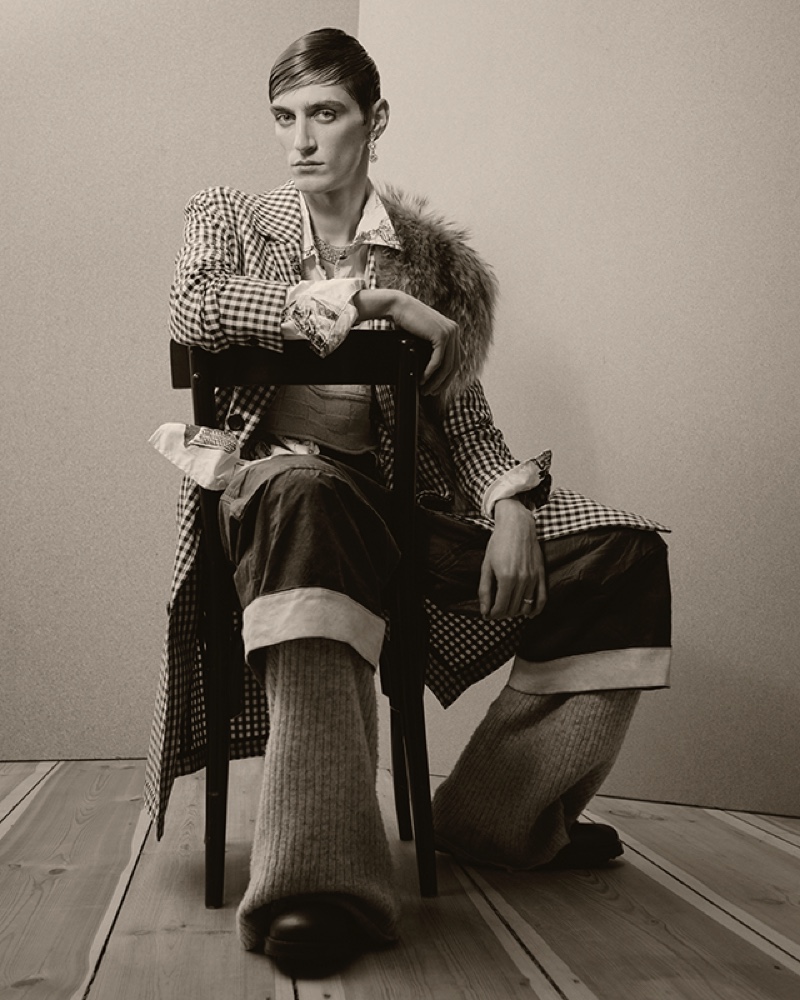 Mihai wears coat AMI, fur Annette Görtz, knit trousers Marc Jacobs, shoes Prada, shirt and pants Paul Harden Shoemakers.