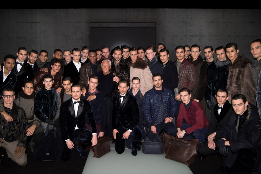 Designer Giorgio Armani appears in a picture with the models who walked for his namesake label.