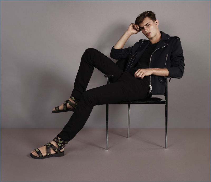 Kit Butler wears Giuseppe Zanotti's gladiator-style sandal "Darin" for the brand's spring-summer 2018 campaign.