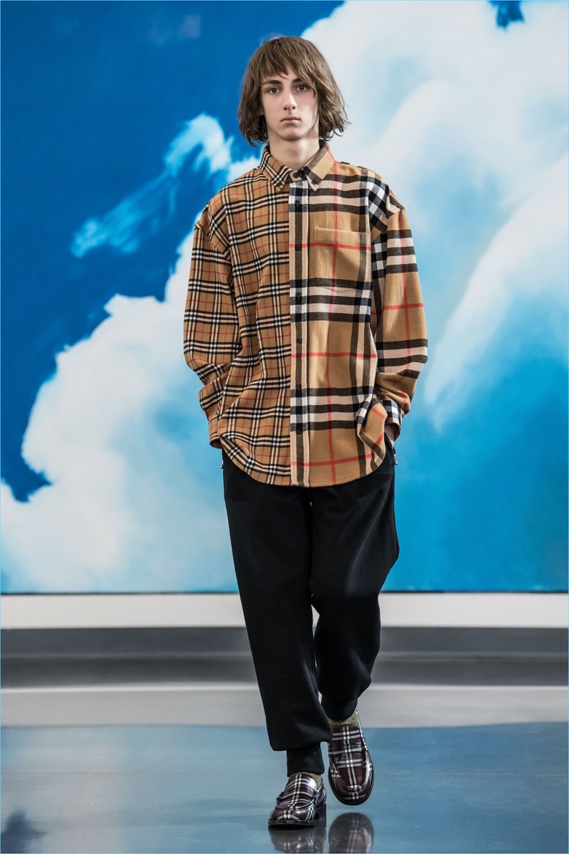 Burberry's iconic check comes together in two different scales for Gosha Rubchinskiy's fall-winter 2018 collaboration.