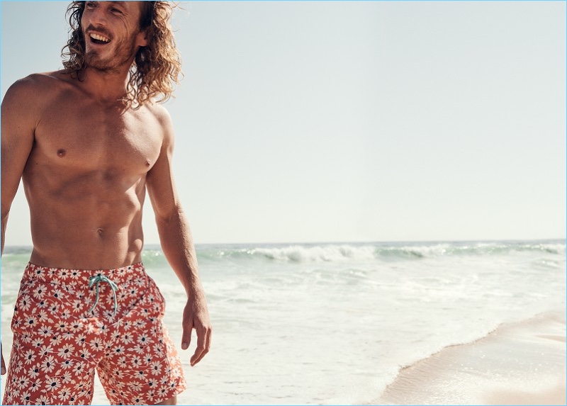 Ready for vacation, J.Crew proposes pink floral print swim trunks.