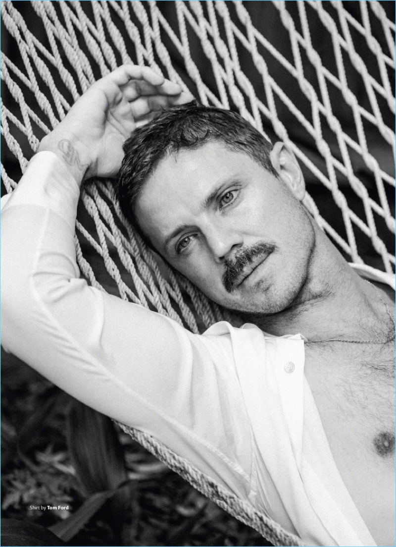 Connecting with Out, Jake Shears wears a Tom Ford shirt.