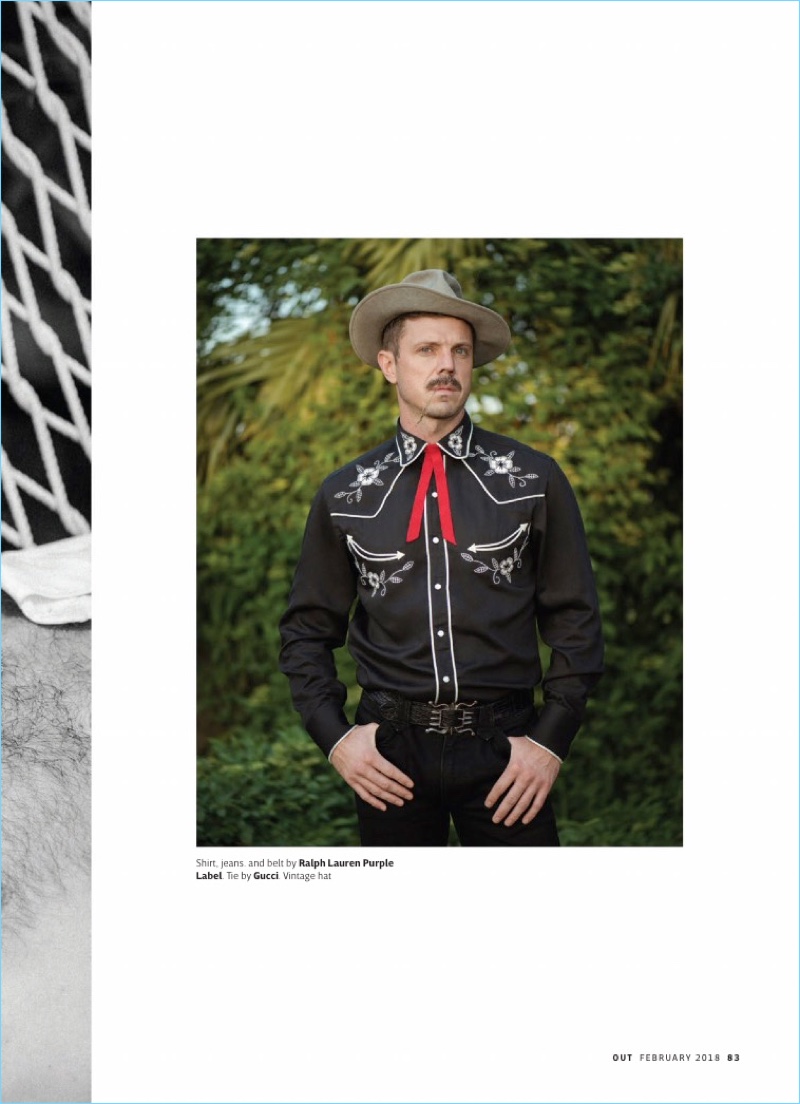 Embracing western style, Jake Shears wears a look by Ralph Lauren Purple. The singer also dons a Gucci tie and vintage hat.