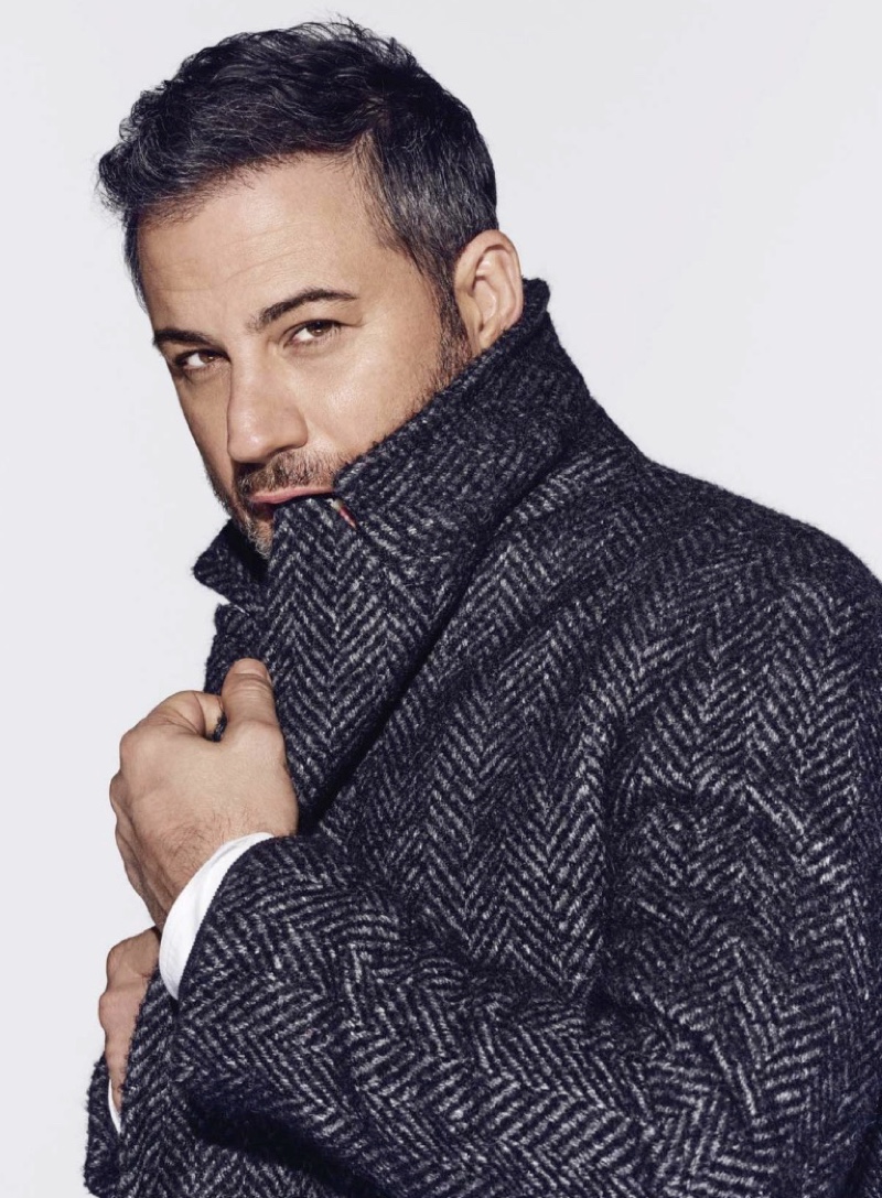 Starring in a photo shoot, Jimmy Kimmel wears a Prada coat and shirt.