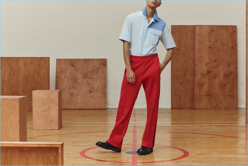 Channel retro vibes in Maison Margiela's camp-collar shirt, drawstring trousers, and leather boots.