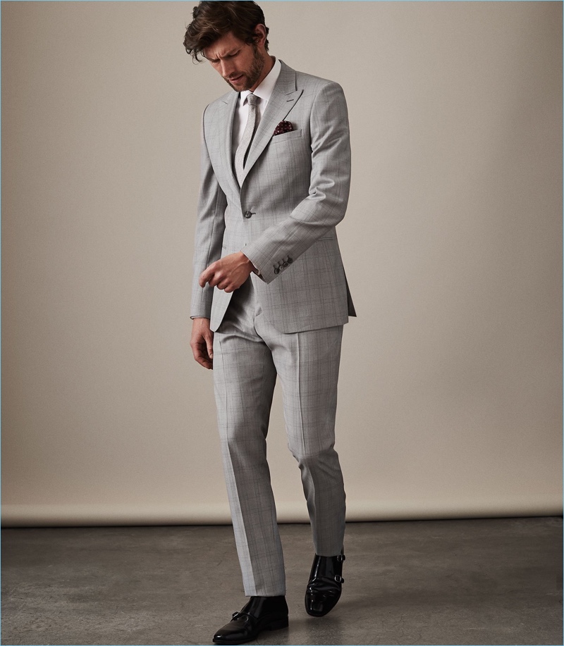 Versatile Suiting: Reiss proposes a soft grey suit that can be dressed up or down.