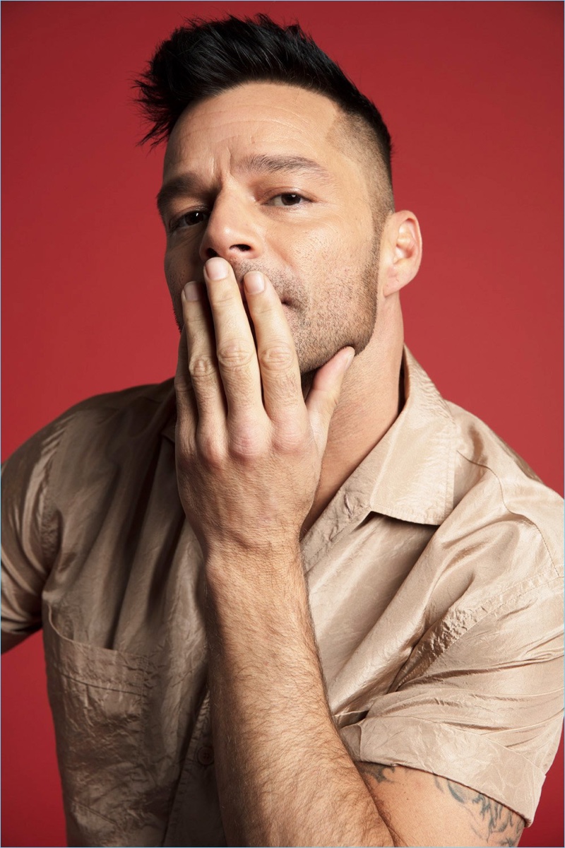 Connecting with Out magazine, Ricky Martin wears a Hermès shirt.