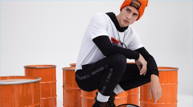 River Island Partners with Blood Brother for Design Forum Collaboration Model Oliver Stummvoll wears a streetwear-inspired look from Blood Brother's River Island collaboration.