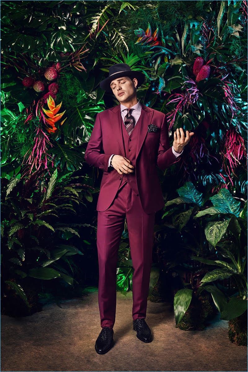 Actor David Schütter sports a burgundy three-piece suit by Rooks & Rocks.